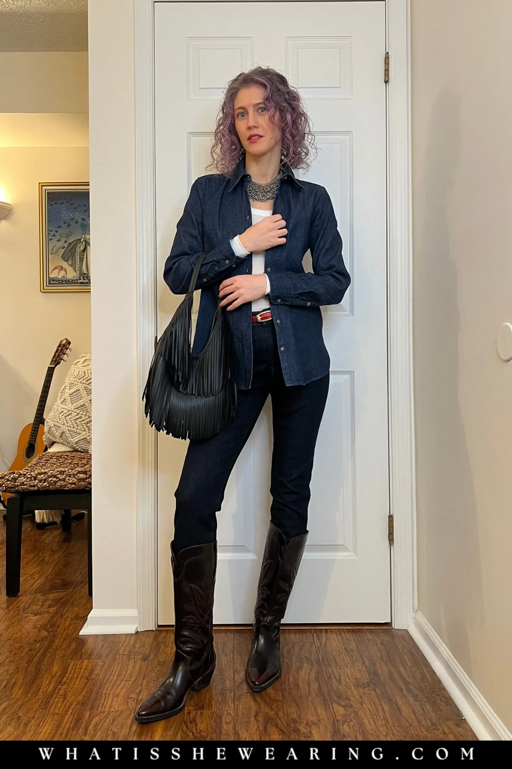 Casual chic denim-on-denim outfit with a dark button-down and skinny jeans.