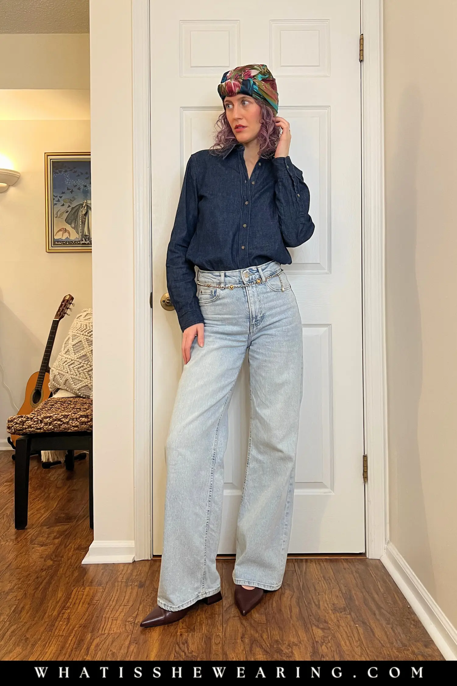 Contrast denim outfit with a boho head scarf and a chain belt.