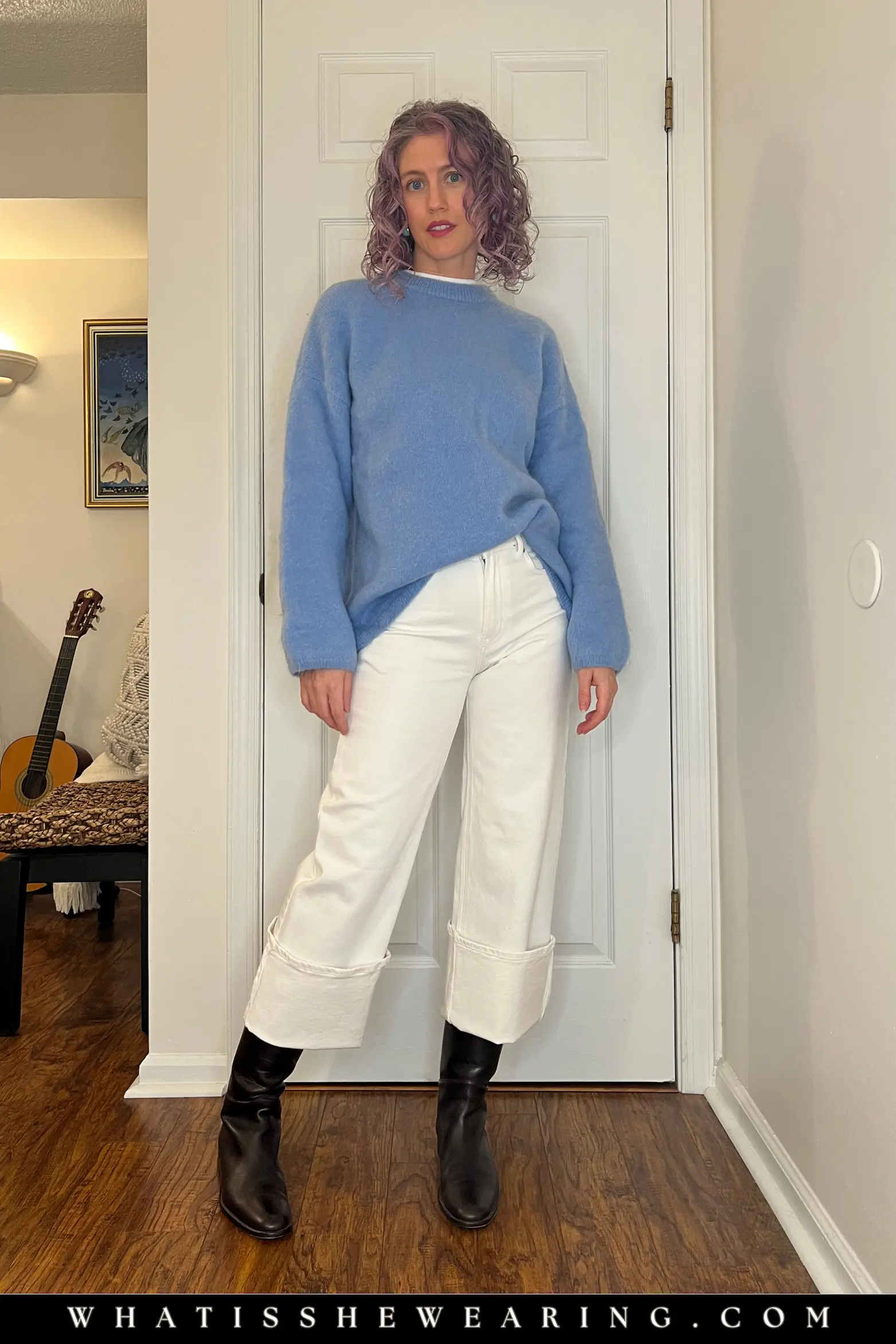 Casual riding boots outfits with wide-leg jeans, oversized knit sweater, and turtleneck for everyday layering