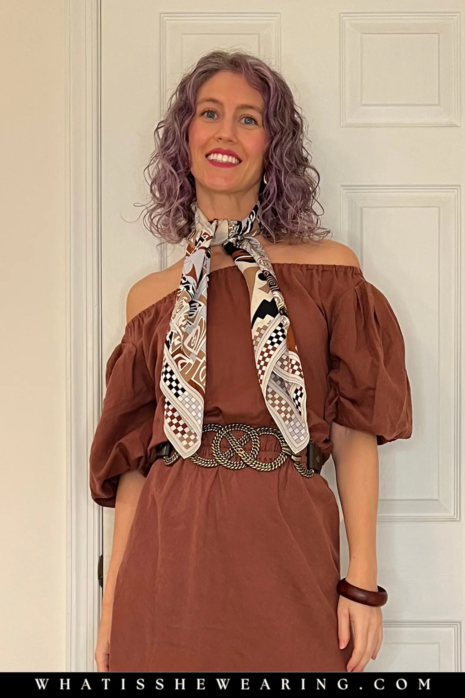 Minimalist Neckerchief Close-Up Minimalist neckerchief: close-up of effortless single tie silk scarf around neck