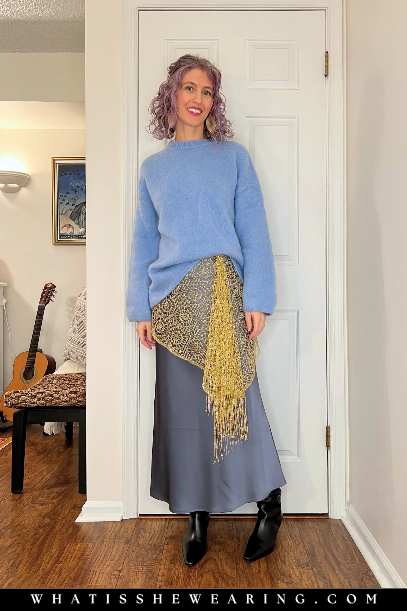 Waist Detailer Close-Up Waist detailer: close-up of asymmetrical silk scarf belt knotted at hip