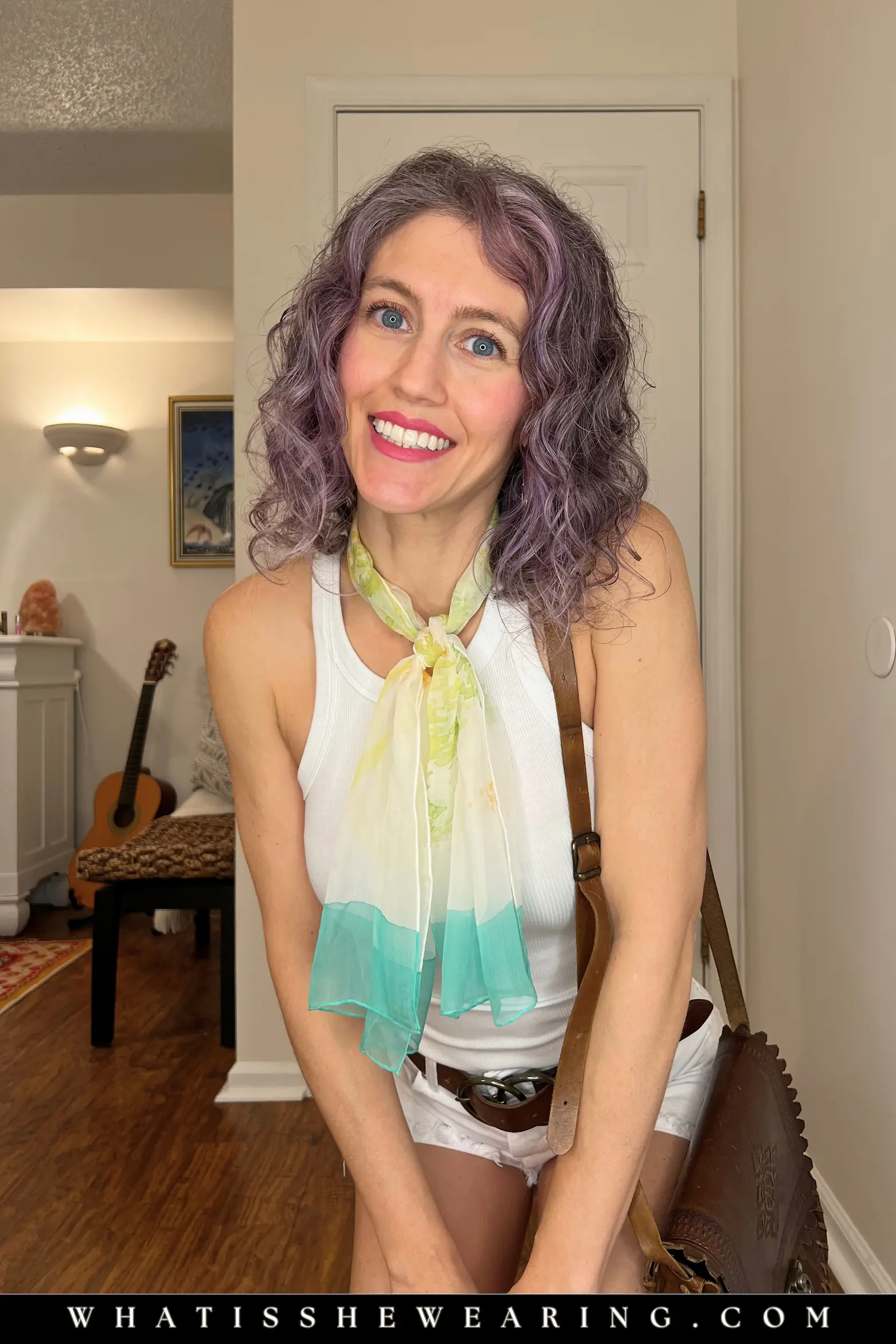 Classic Double Knot Close-Up Classic double knot: close-up of secure silk scarf tie on neck with draped ends