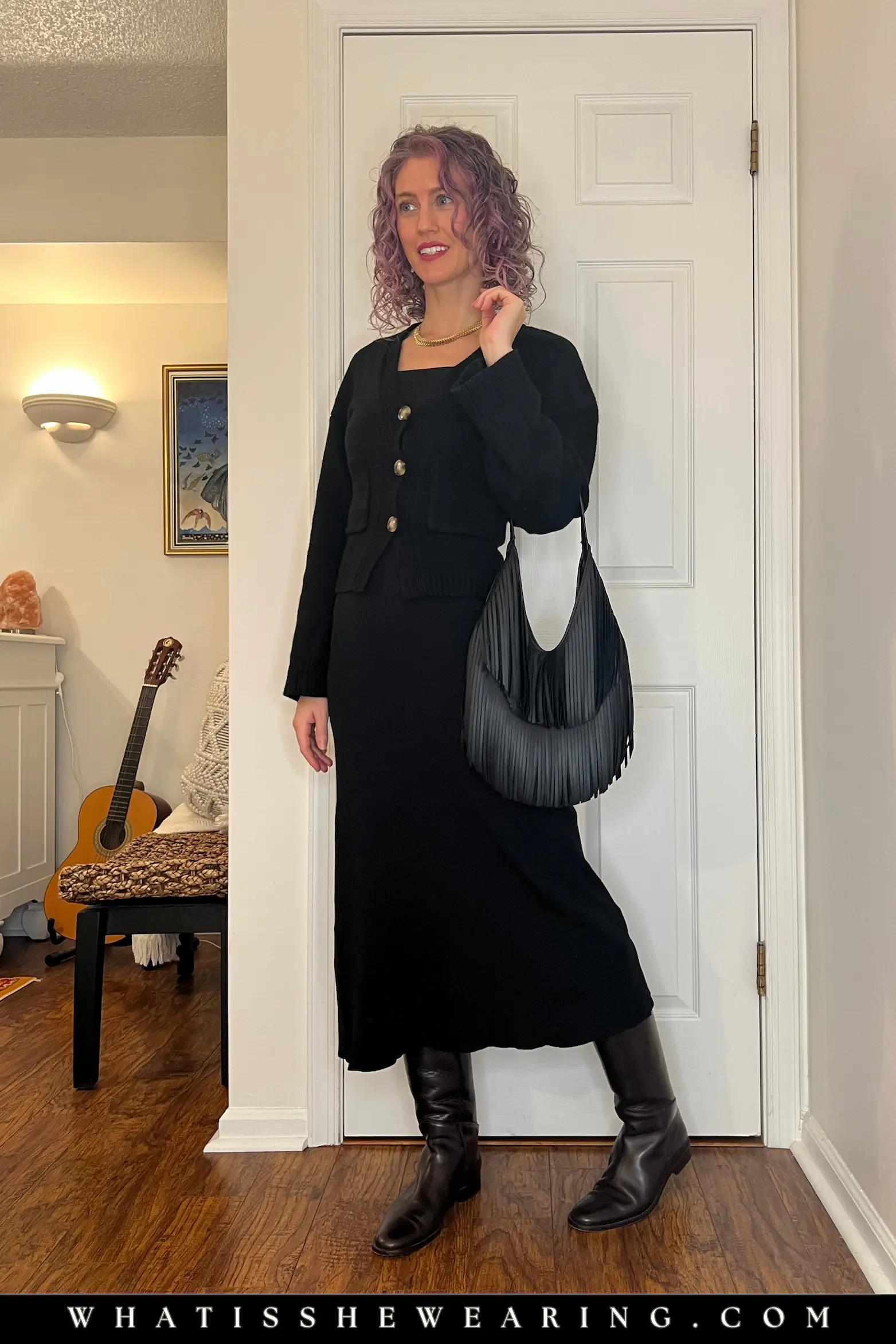 Riding boots and dresses: knit black dress, wool cardigan, and brown boots for cozy feminine elegance