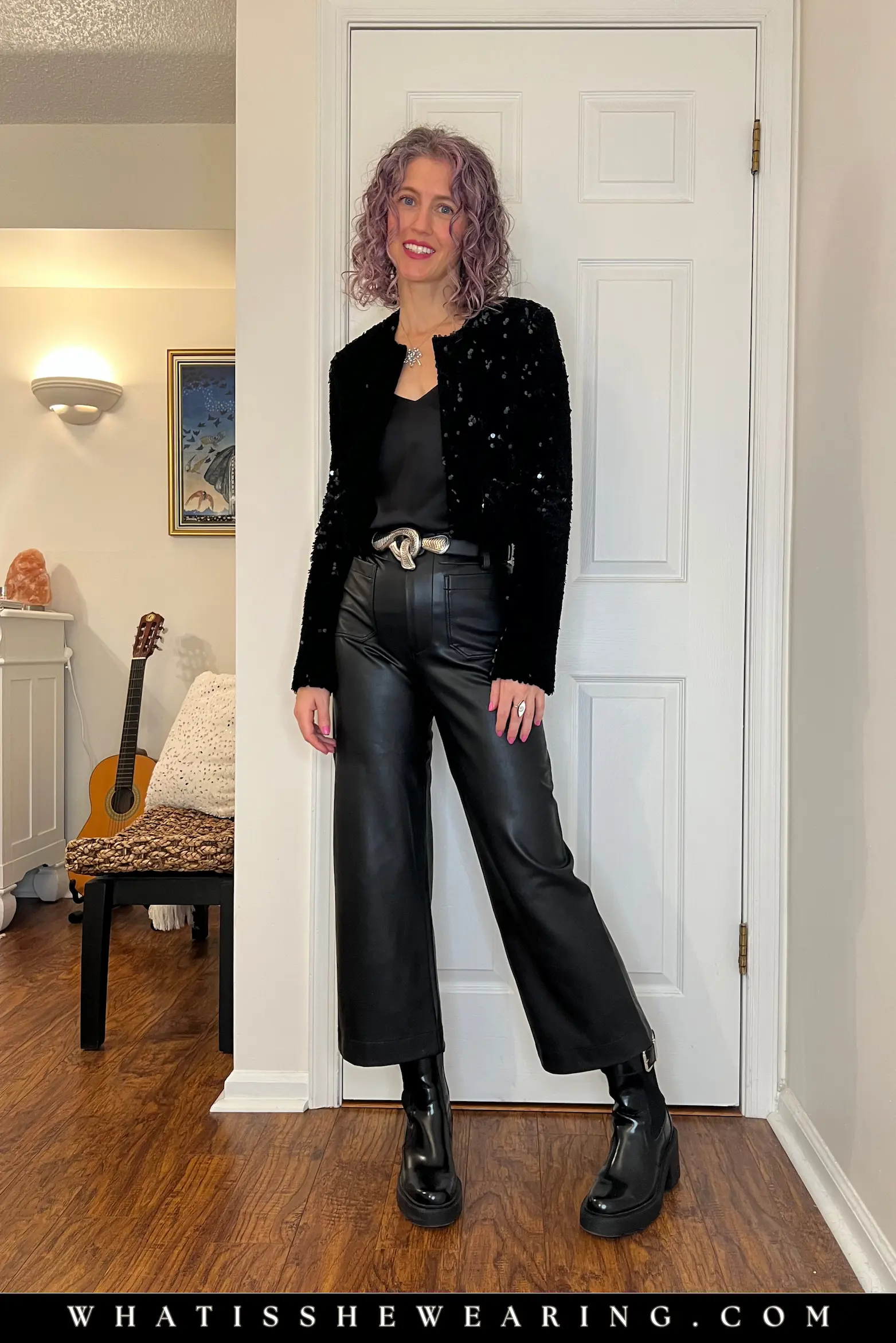 Velvet Leather Pants Christmas Drama Edgy all-black holiday party outfits with cropped black velvet sequin jacket, satin camisole, vegan leather pants, Western belt, and moto boots for textured festive looks.