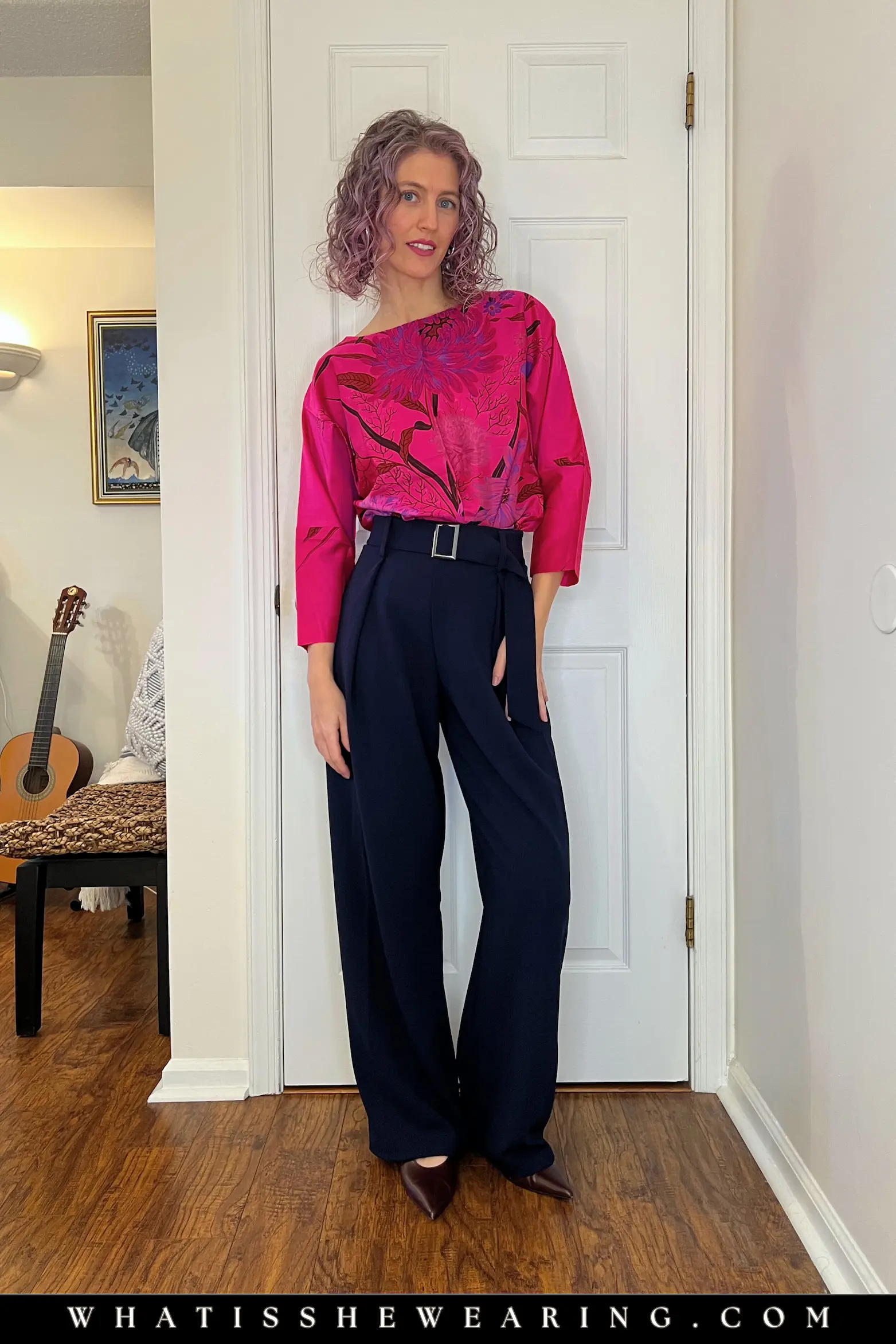 Elegant Navy and Magenta Blouse Outfit Woman in elegant navy blue outfit with vibrant silk magenta blouse—what to wear with navy blue for statement-making wow and bold evening business casual.