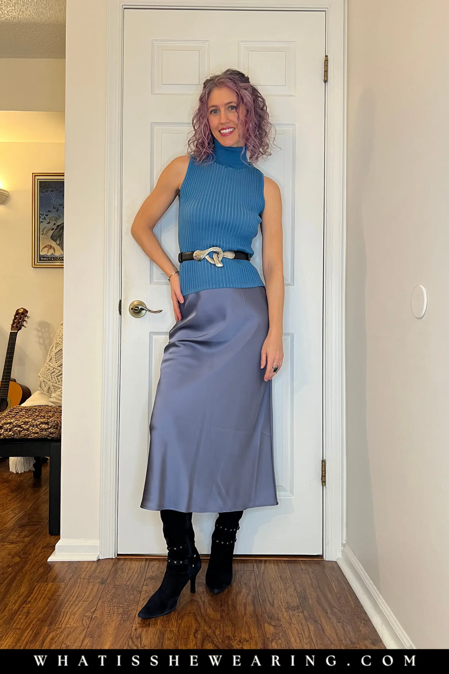 Belted Turtleneck + Midi Skirt – Upscale Bar Hopping Look Classy bar hopping outfits: belted sleeveless turtleneck + satin midi skirt + navy boots