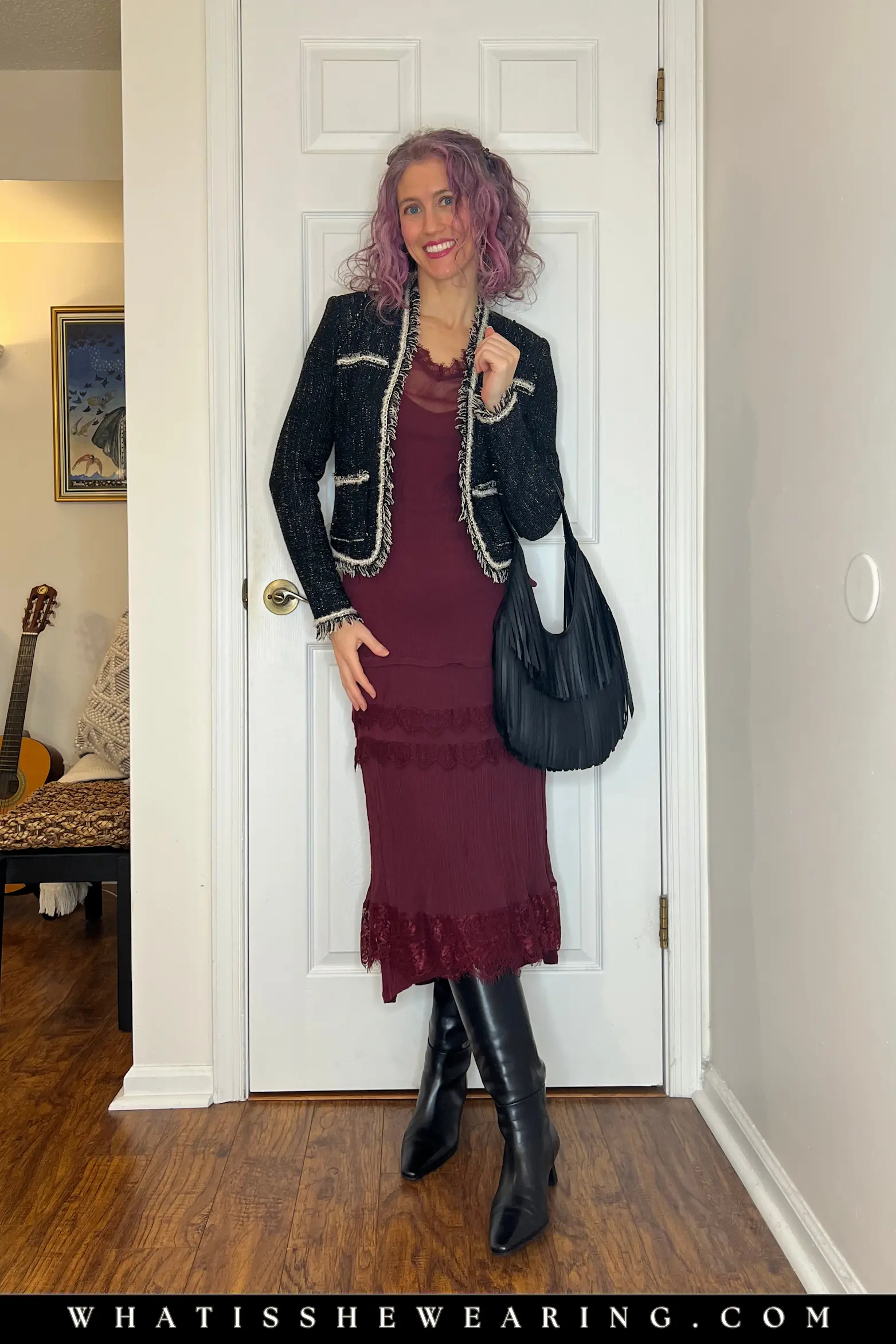 Knit lady jacket outfit with a burgundy midi dress, tall boots, and hobo bag