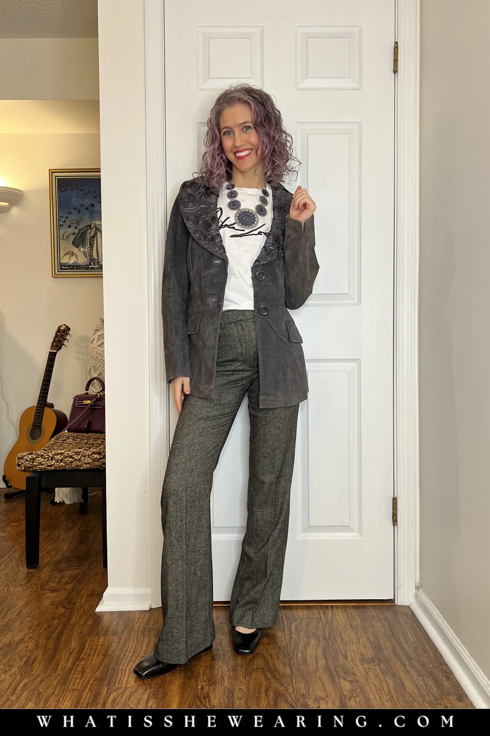 Gray Suede Jacket with Raised Florals over White Tee Woman wearing white t-shirt, gray trousers, ballet flats, and gray suede jacket with raised floral embellishments for soft spring layering
